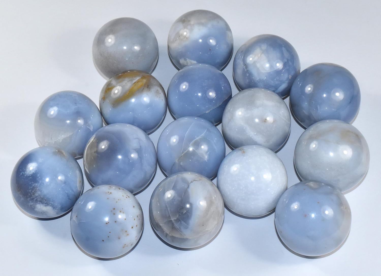 Pair 45mm Blue Chalcedony Carved Spheres with Stand