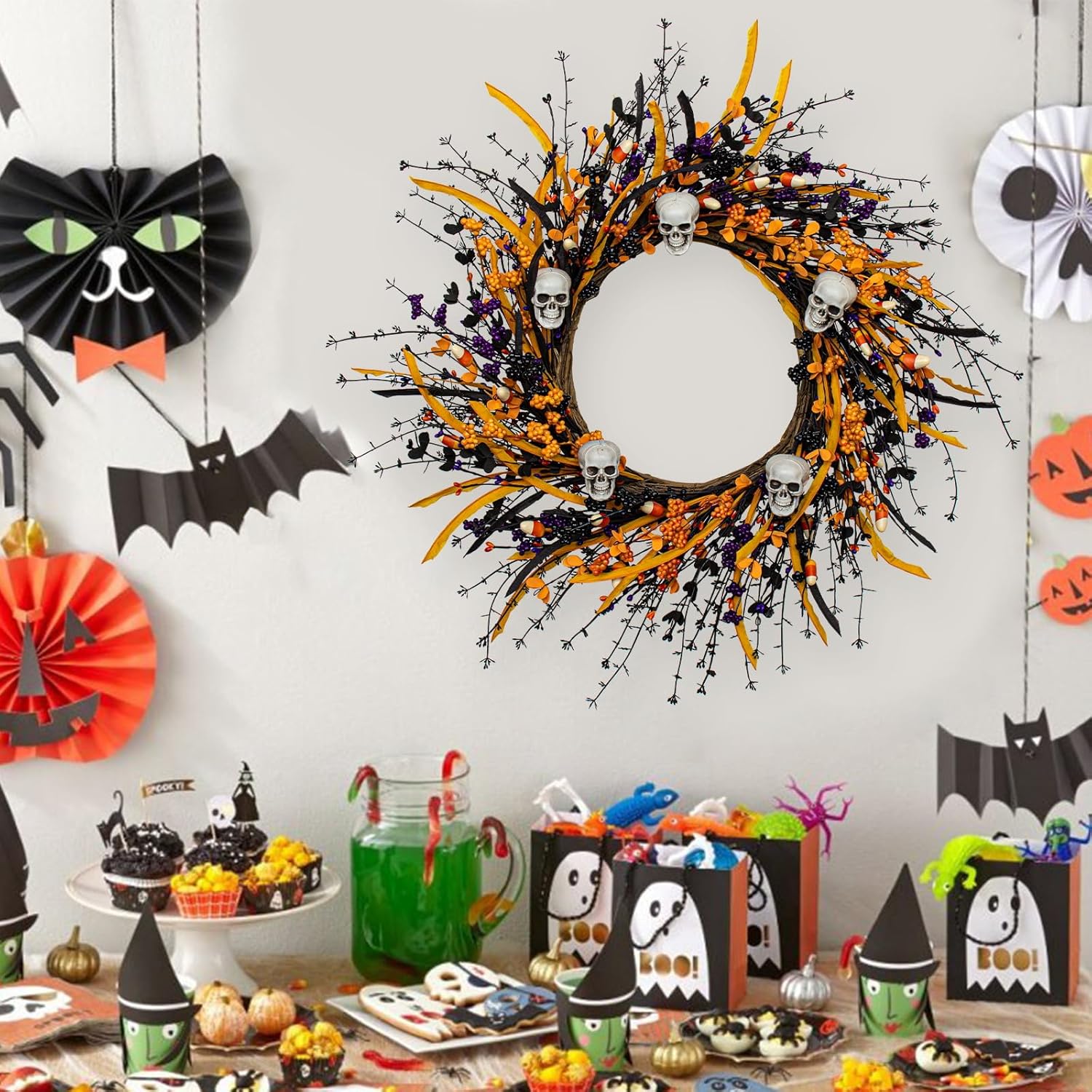 Black Halloween Wreath with Skulls and Candy Berries